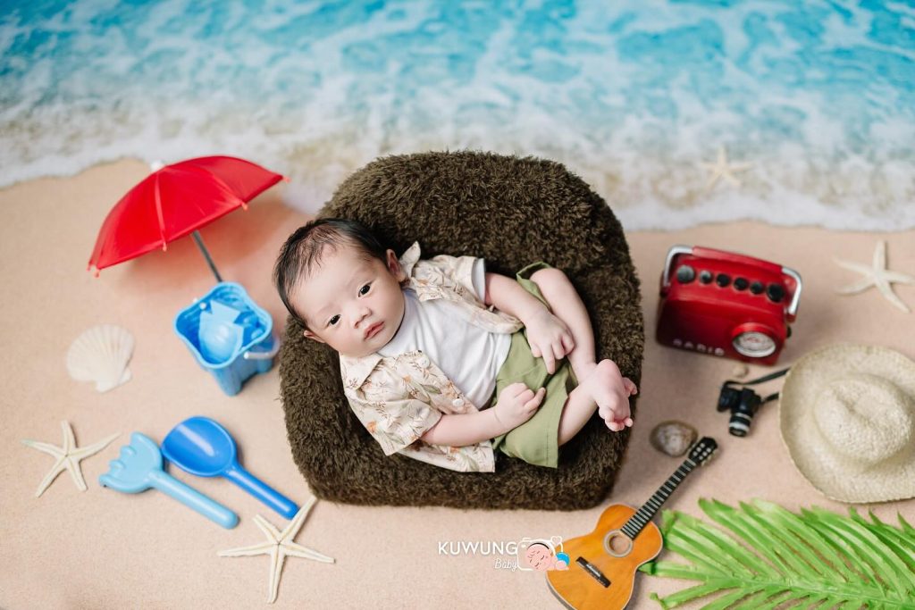 by the peach newborn photoshoot